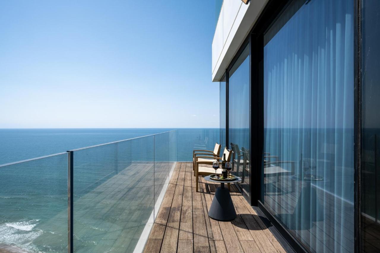 Vert Lagoon Netanya By Afi Hotels Exterior photo The view from the balcony of a suite at the hotel