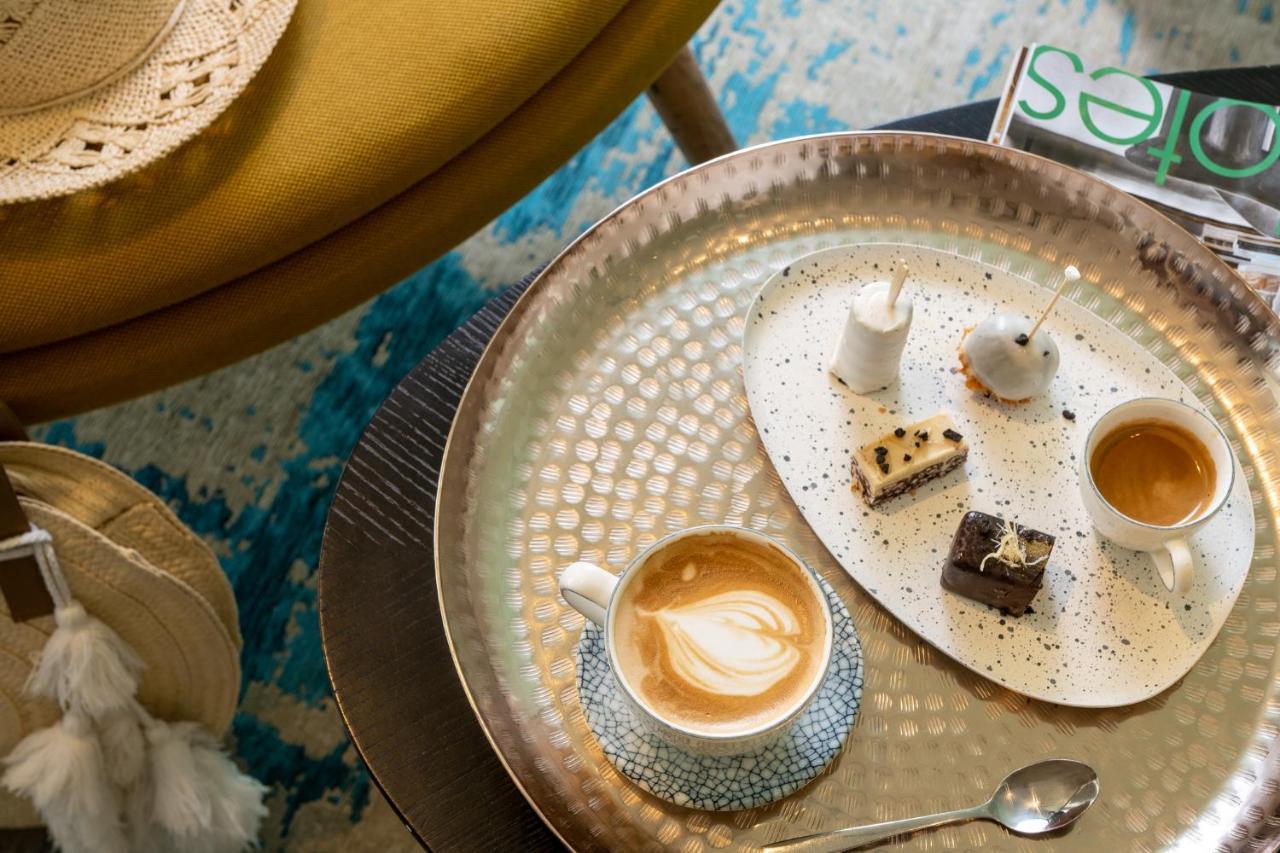 Vert Lagoon Netanya By Afi Hotels Exterior photo A coffee with a heart-shaped latte art