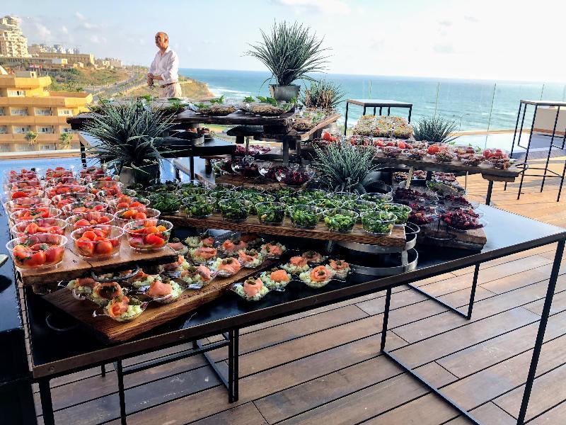 Vert Lagoon Netanya By Afi Hotels Exterior photo A buffet at a hotel